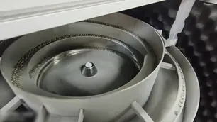 Máquina de inspeção visual de materiais magnéticos